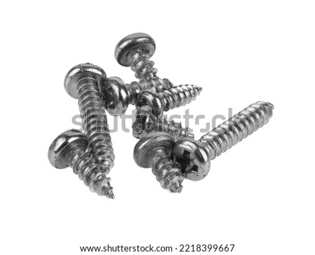 Metal self-tapping screws isolated on a white background. Detail for design. Design elements. Macro. Full focus. Background for business cards, postcards and posters.