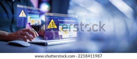 Businessman using computer laptop with triangle caution warning sing , Http 404 error not found page template concept. Server Not Found Error Danger Caution Warning Concept. 404 Error Page Not Found. Royalty-Free Stock Photo #2218411987