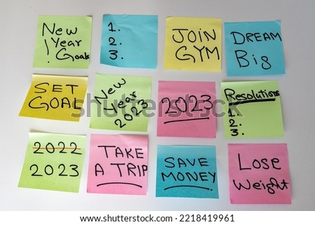 New Year 2023 goals hand written on a sticky notes on a white isolated background Royalty-Free Stock Photo #2218419961