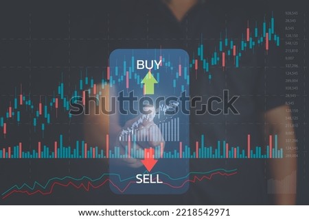 Stock market, planning and strategy, crypto, Business growth, progress or success concept. Businessman or trader is showing a growing virtual hologram stock,  buy and sell price invest in trading. Royalty-Free Stock Photo #2218542971