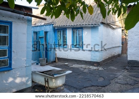 Ukraine. Berdyansk region. The village of Nikolaevka. An old country house with a sink bath.
