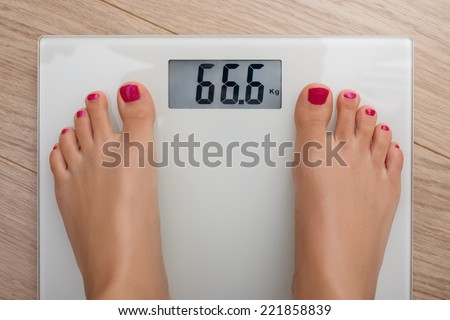 Digital Bathroom Scale 666 Royalty-Free Stock Photo #221858839