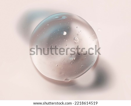 Cosmetic gel drop on beige background with round shadows Royalty-Free Stock Photo #2218614519