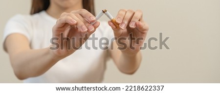 Quit, stop smoking, addiction asian young woman, girl refusing cigarette, smoker quitting smoke, hand in broken, break tobacco. Quit bad habit, health care concept. Willpower lifestyle of people.