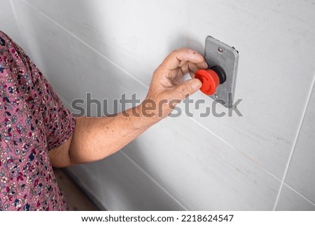Asian senior or elderly old lady woman patient use toilet bathroom handle security in nursing hospital ward, healthy strong medical concept.