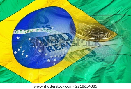 Brazil flag and country currency. Selective focus.