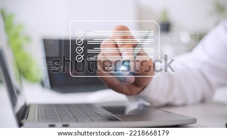 Electronic signature concept, business people sign electronic documents on digital documents, paperless office, future business contract signing.