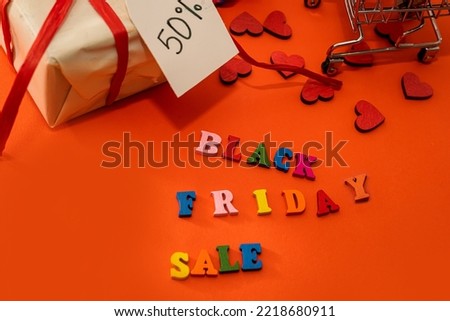 inscription in colored letters black friday gifts and discount label isolated on plain background. Black friday concept