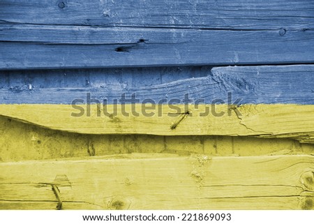 The concept of national flag on wooden background: Ukraine