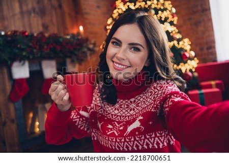 Portrait of attractive cheerful lady make selfie hand hold coffee cup enjoy festive miracle house indoors