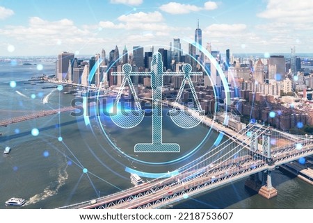 Aerial panoramic city view of Lower Manhattan. Brooklyn and Manhattan bridges over East River, New York, USA. Glowing hologram legal icons. The concept of law, order, regulations and digital justice