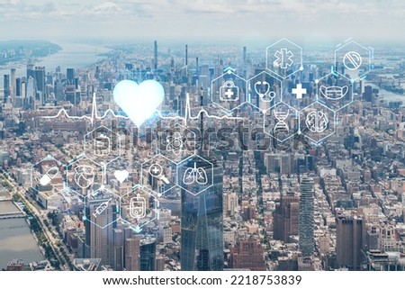 Aerial panoramic helicopter city view of Upper Manhattan, Midtown and Downtown, New York, USA. Health care digital medicine hologram. The concept of treatment and disease prevention