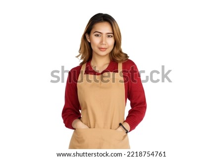 Coffee shop SME owner excited brunette asian woman wearing sweater and apron isolated on white background, Looking camera