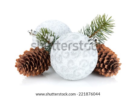 Silver christmas baubles and fir tree. Isolated on white background