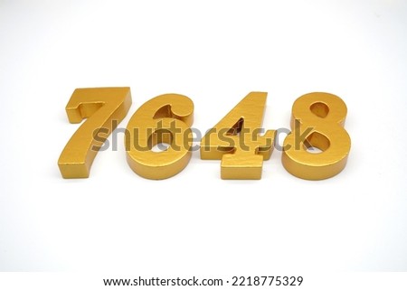    Number 7648 is made of gold-painted teak, 1 centimeter thick, placed on a white background to visualize it in 3D.                                  