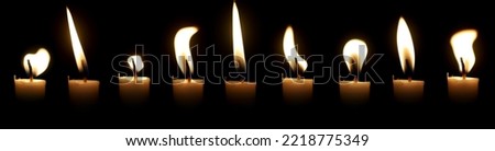 Set The candle flame glows in the dark dark night as background decoration in religious ceremonies and birthday celebrations. Many people have a happy big romantic holiday.