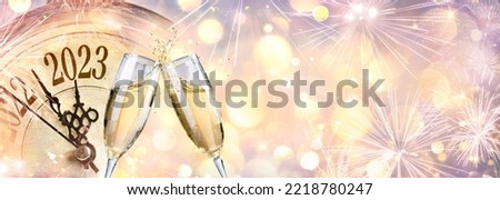 2023 - New Year Celebration With Champagne And Clock - Abstract Defocused Bokeh Lights Royalty-Free Stock Photo #2218780247