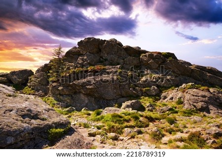 Rock on the top of the mountain Grosser Arber at sunset. National park Bayerischer Wald, Germany. Royalty-Free Stock Photo #2218789319