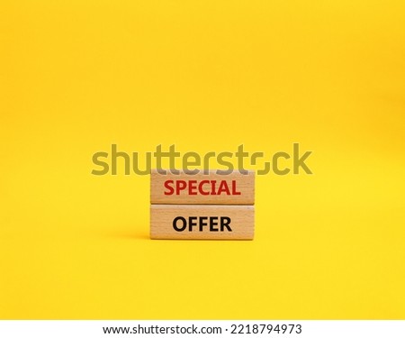 Special offer symbol. Concept word Special offer on wooden blocks. Beautiful yellow background. Business and Special offer concept. Copy space