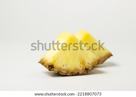 Slice of pineapple on a white background. Tropical Fruit