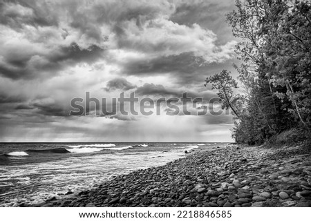 USA, Michigan, Munising. Receding storm clouds at Pictured Rocks National Lakeshore