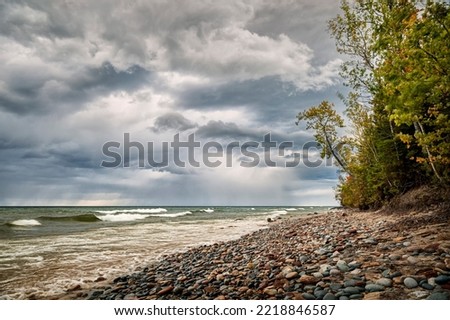USA, Michigan, Munising. Receding storm clouds at Pictured Rocks National Lakeshore