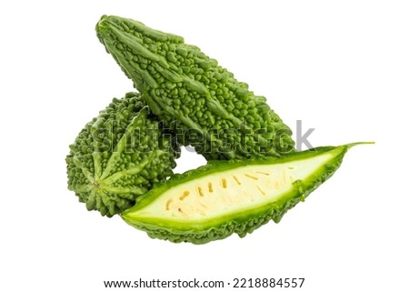 Fresh bitter gourd Bitter cucumber or bitter melon with cut slice isolated on white background. Royalty-Free Stock Photo #2218884557