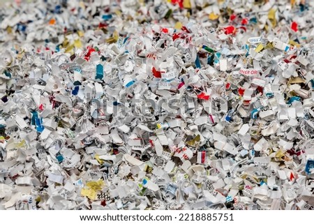Pile of shredded paper. Document shredding, identity theft and fraud concept Royalty-Free Stock Photo #2218885751