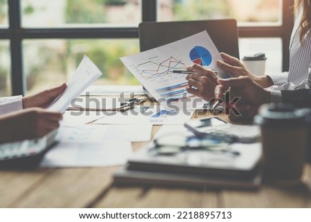 Startup business team meeting working on 

graph document and laptop new business project, Group of Business People Diverse Brainstorm Meeting Concept Royalty-Free Stock Photo #2218895713