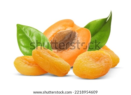 Tasty dried apricots and fresh one with green leaves on white background Royalty-Free Stock Photo #2218954609