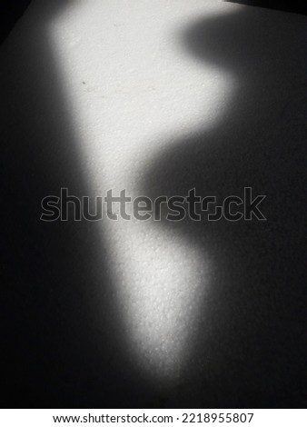 
the art of blurring the sun's rays between the roofs of houses or tiles