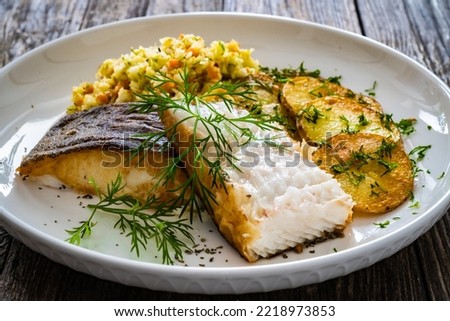 Fish dish - fried halibut with French fries and 