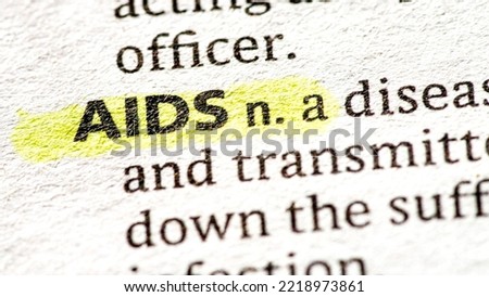 Close up photo of AIDS in a dictionary book