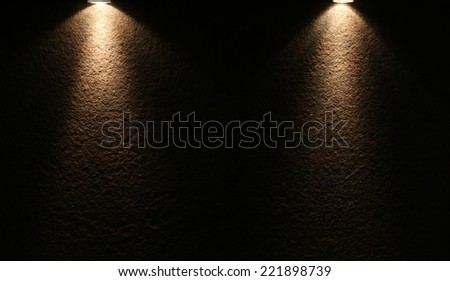 dark spotlight with space for your text or picture.