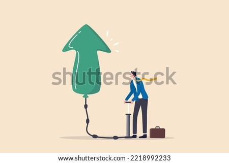 Growing business, raising income or wages, growth or improvement, increase price, interest rate or inflation, rising up direction concept, businessman inflate air pump into floating green arrow up. Royalty-Free Stock Photo #2218992233