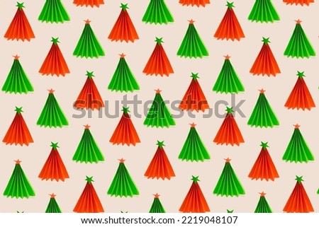 Colorful seamless pattern made of small childish origami Christmas tree with a star on its top. Creative Xmas and New year craft idea.