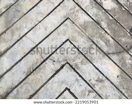 Arrow lines cement floor texture pattern background 