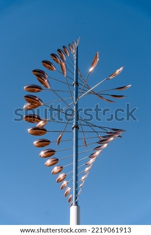 abstract photo of a metal construction against the sky. blue and pink color scheme