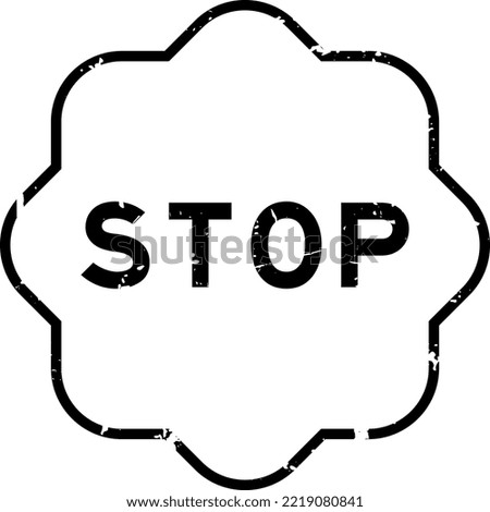 Grunge black stop word rubber seal stamp on white background