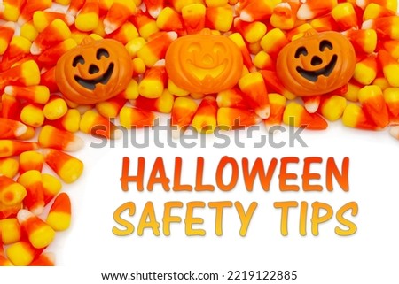 Halloween Safety Tips greeting with orange and yellow candy corn 