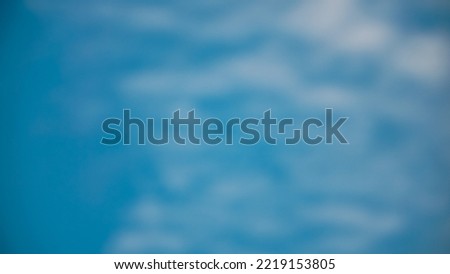 Defocused photo of beautiful pattern of cloudy sky - abstract background