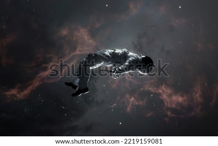 3D illustration of astronaut falling to space. 5K realistic science fiction art. Elements of image provided by Nasa