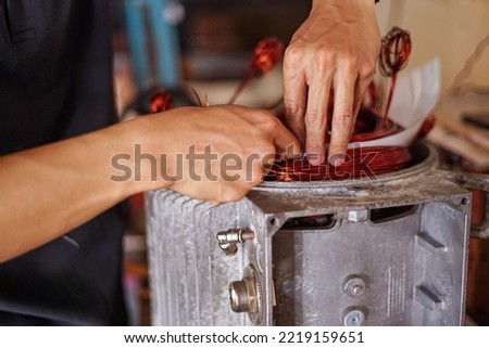 Procedure for replacing the motor windings Royalty-Free Stock Photo #2219159651
