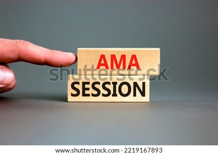 AMA ask me anything session symbol. Concept words AMA ask me anything session on wooden blocks on a beautiful grey background. Business and AMA ask me anything session concept. Copy space.