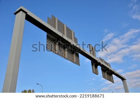 road signs on the highway. frame gate made of metal. the brand is made up of individual segments that can be replaced piece by piece in case of damage. large area does not vibrate in strong wind