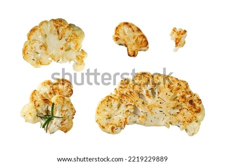 Fried Cauliflower Slices Isolated, Baked Cauliflower Steaks, Roasted Cabbage Steak with Herbs Top View, Clipping Path Royalty-Free Stock Photo #2219229889