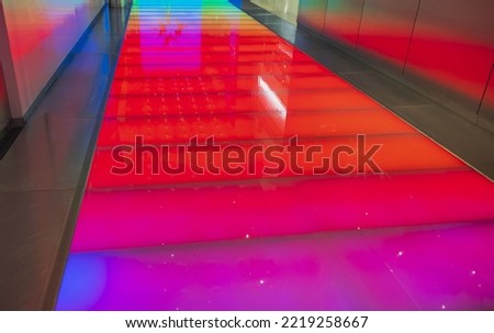 Close up view of colorful illuminated floor. Modern technology concept. USA.