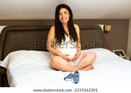 Portrait of pregnant woman.  Pregnancy, love, maternity and expectation concept. Pregnant Belly. Pregnant woman expecting baby.