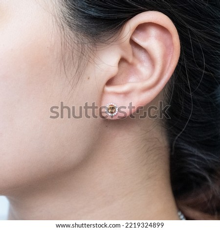 Asian woman with diamond earring Thailand