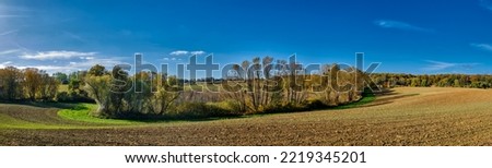 Vast landscape with farmland and trees on the edge of the nature reserve "Grunsiner Forst" between "Zuchenberg" and "Gehegemuehle" - panorama from 7 pictures
